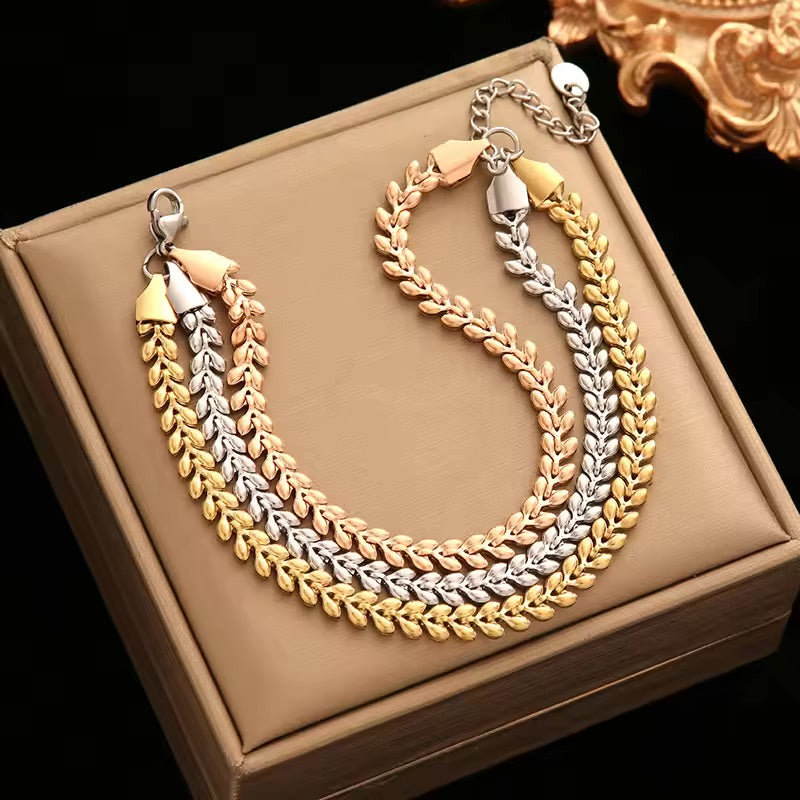 Hearty Knot - Knot Design Gold Tone Twisted Bracelet Bangles For Women