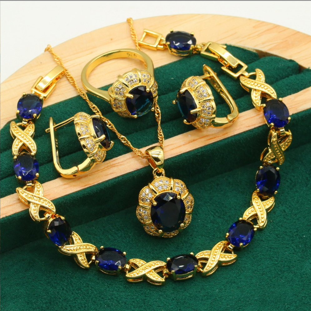 Bastet's Grace - Luxury Peridot Ruby Pendant Earring Bracelet & Ring Set For Women