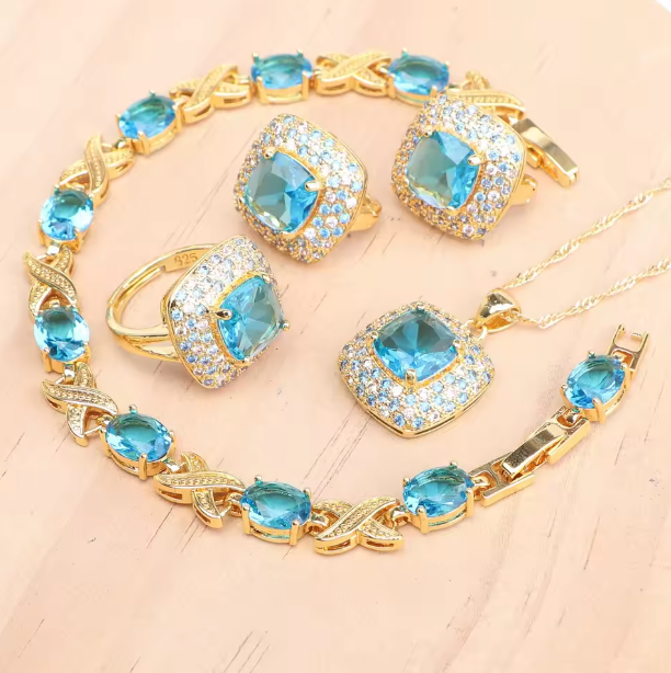 AzureGrace - Luxury Blue Zircon 4-Piece Jewelry Set — Gold-Tone 925 Sterling Silver Necklace, Earrings, Bracelet & Ring