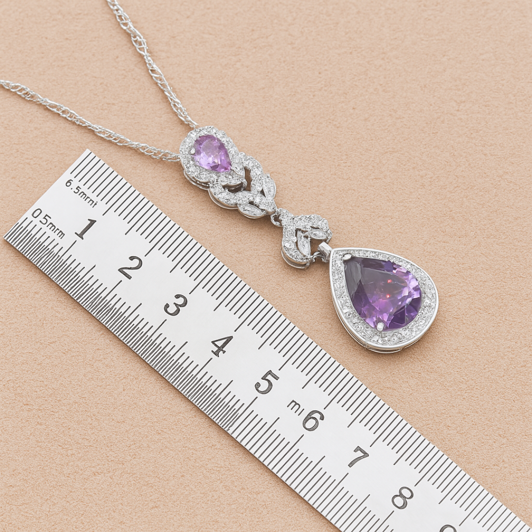 TrulyChoose amethyst jewelry set for women featuring silver pendant with purple teardrop stones next to ruler