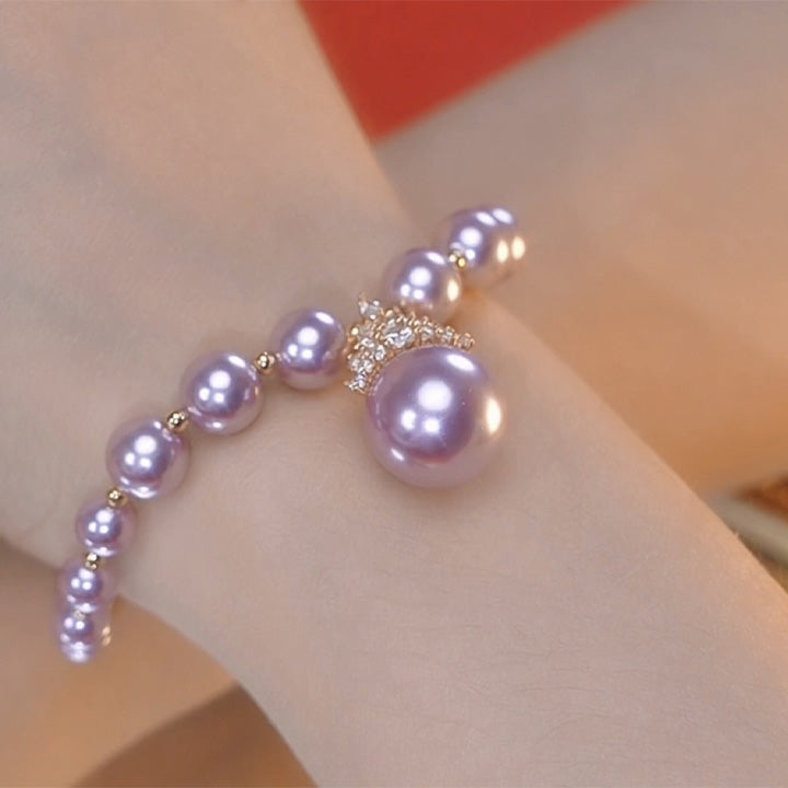 Truly Choose luxury pearl jewelry set featuring a delicate bracelet with lavender pearls and gold accents