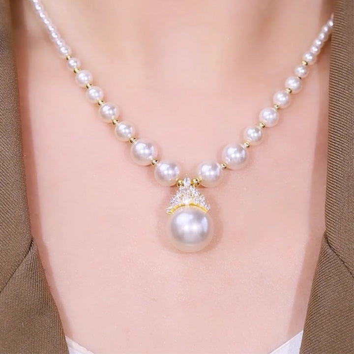 Luxury pearl jewelry set necklace with large central pearl and gold accents by Truly Choose