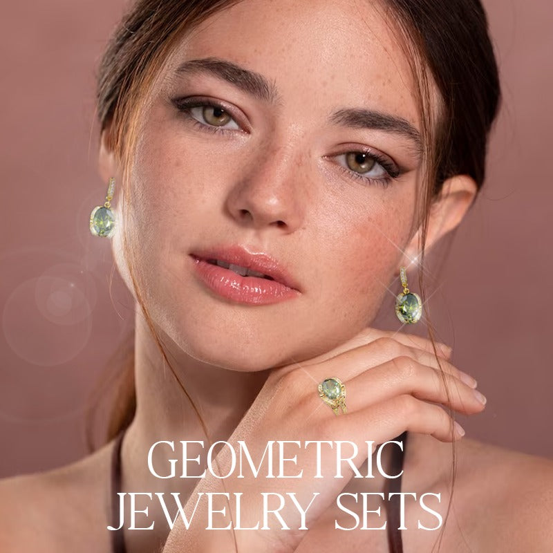 Close-up of woman wearing a luxury peridot jewelry set with geometric earrings and ring