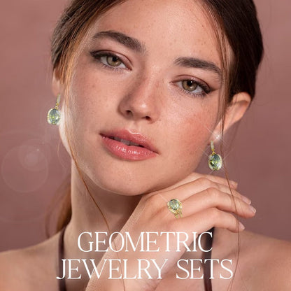 Close-up of woman wearing a luxury peridot jewelry set with geometric earrings and ring